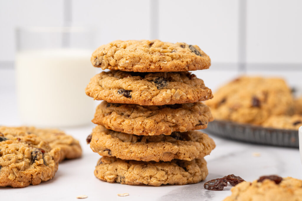 A stack of Brown Butter Oatmeal Raisin Cookies on a table.