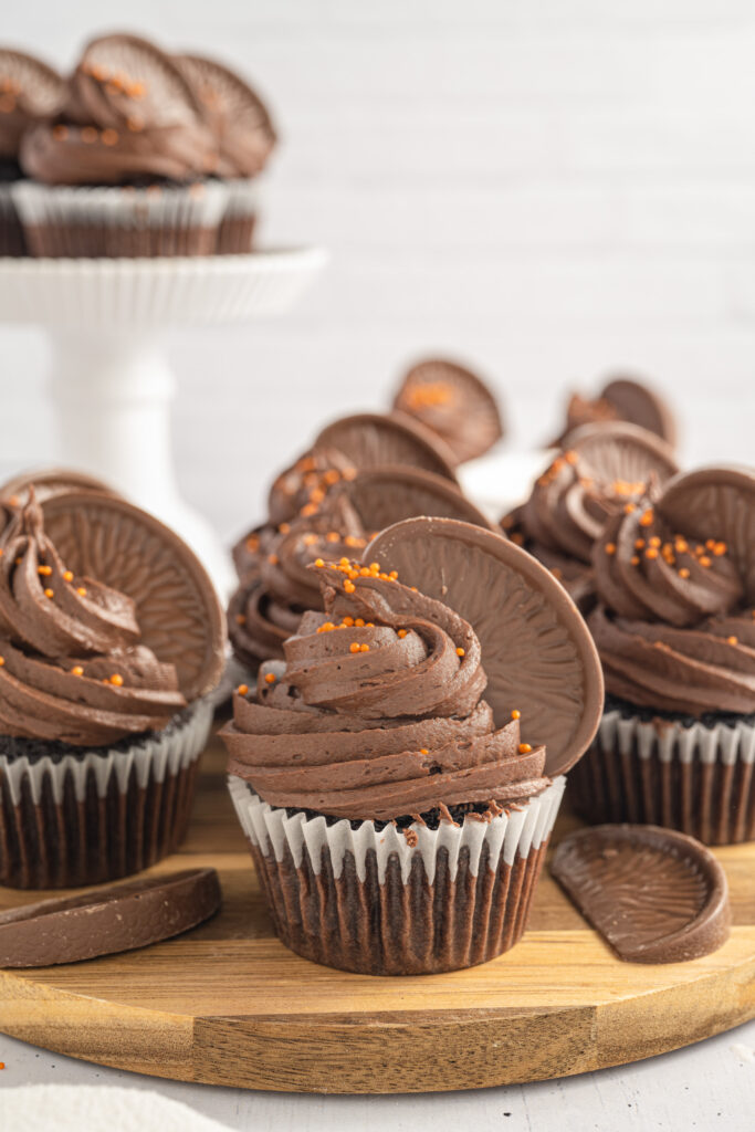 Chocolate Orange Cupcakes displayed on a table.