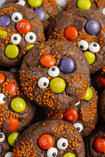 Halloween Monster Cookies piled on a plate