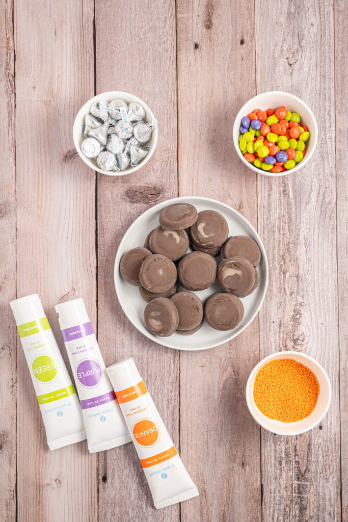 Ingredients for Peanut Butter Witch Hat Cookies laid out on a table.