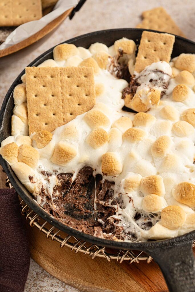 S'Mores Dip with a scoop taken out of it.