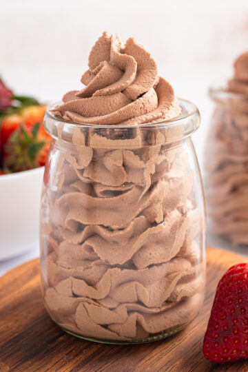 Chocolate Whipped Cream piped into a small jar.