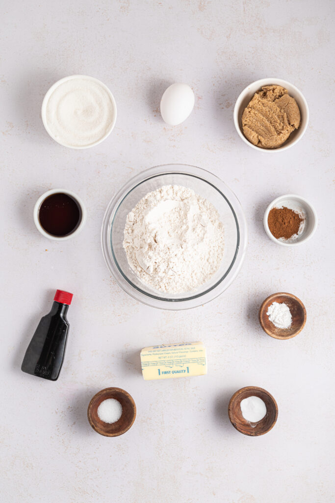 Ingredients for maple snickerdoodles are laid out on a table.