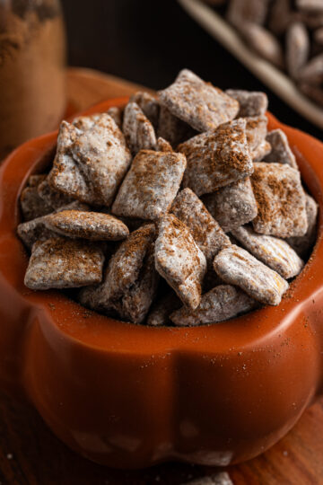 A bowl full of pumpkin spice puppy chow.