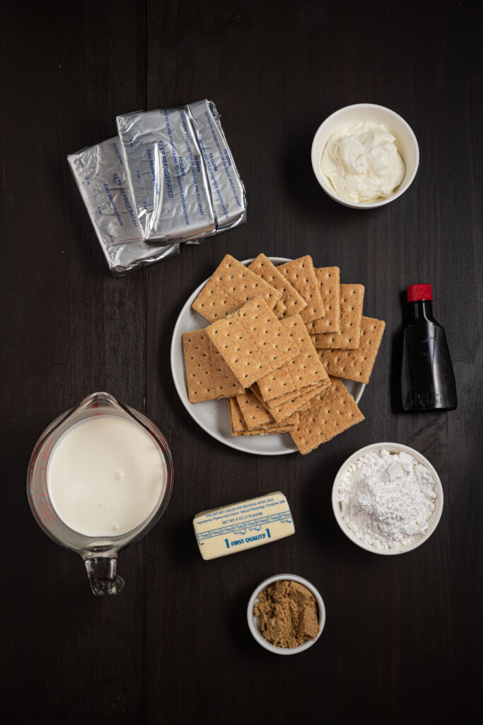 Ingredients for no bake cheesecake on a table.